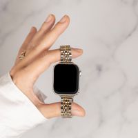 Selencia Slim Steel Jubilee Inspired schakelbandje Apple Watch Series 1 t/m 9 / SE (38/40/41 mm) | Series 10 (42 mm) - Zilver & Goud