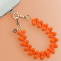 Selencia Transparent Case with Hooks + Lova Wrist Strap Apple iPhone 16 Pro - Orange