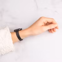 Selencia Slim Steel Jubilee Inspired schakelbandje Apple Watch Series 1 t/m 9 / SE (38/40/41 mm) | Series 10 / 11 (42 mm) - Zwart