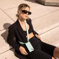 Selencia Siliconen hoesje met afneembaar koord Apple iPhone Xr - Turquoise