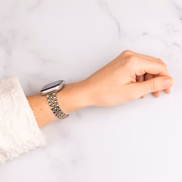 Selencia Slim Steel Jubilee Inspired schakelbandje Apple Watch Series 1 t/m 9 / SE (38/40/41 mm) | Series 10 / 11 (42 mm) - Zilver & Goud